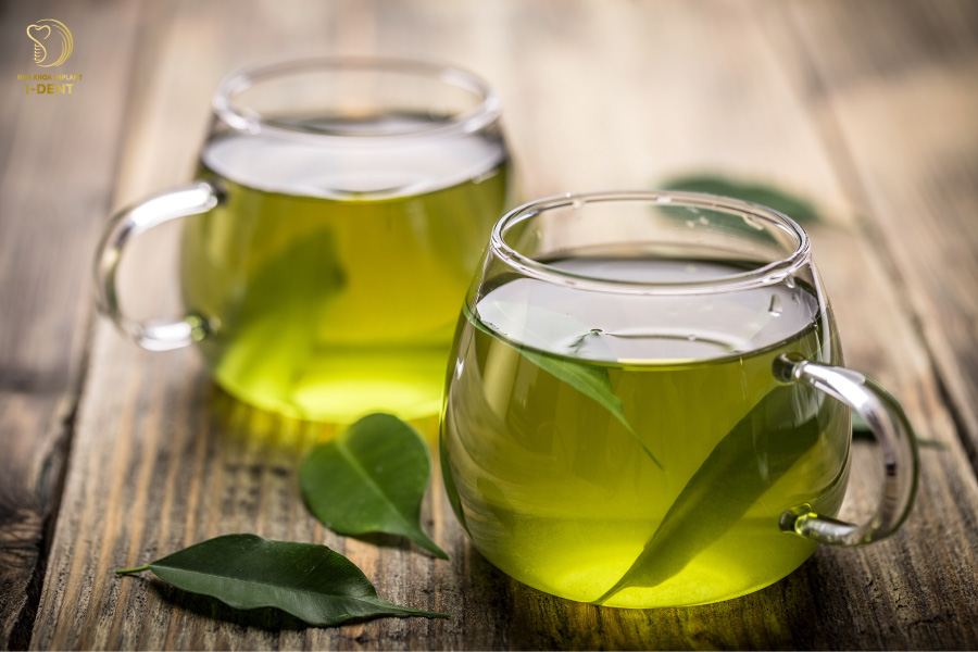 Nước trà xanh Dùng nước trà xanh súc miệng hằng ngày để trị viêm tủy răng
